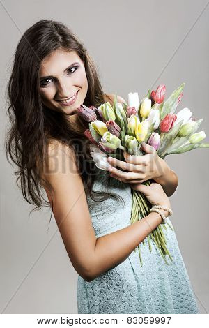 The Young Girl With Plastic Tulips
