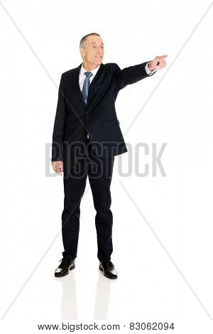 Full length boss dismissing someone.