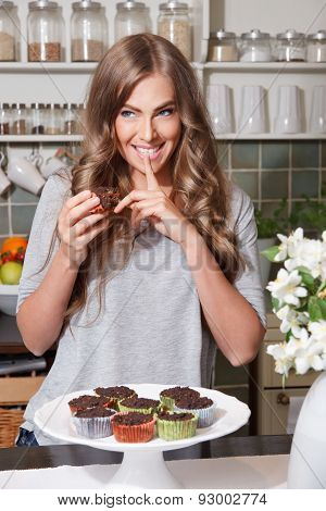 Woman On Diet Eating Sweets In Secret