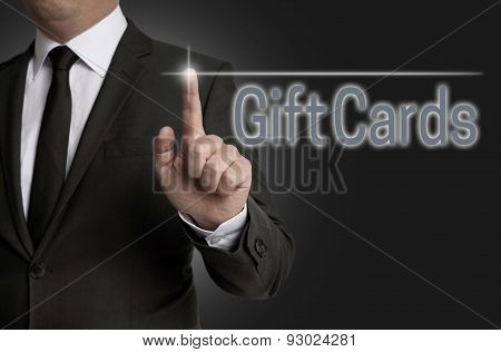 Giftcard Touchscreen Is Operated By Businessman