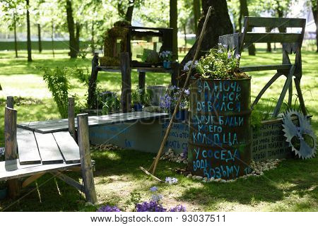 ST. PETERSBURG, RUSSIA - JUNE 4, 2015: Installation Programme Vremya during the festival Emperor's Gardens of Russia. The exposition Silk Road Gardens is in focus of festival this year