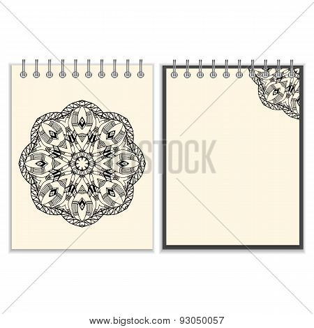 White cover notebook with handmade black pattern