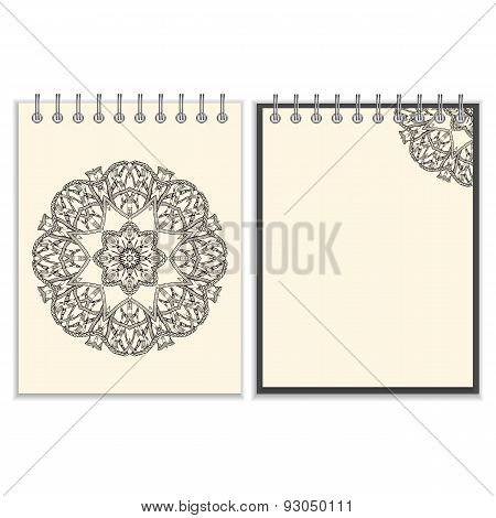 White cover notebook with handmade black pattern