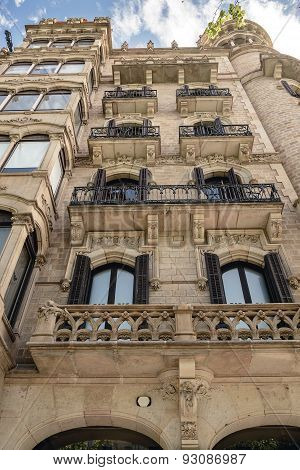 Facade of typical residential building in  Eixample district, Barcelona, Spain