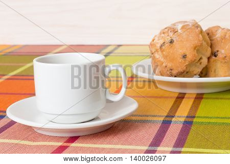 White coffee Cup cupcakes on the table