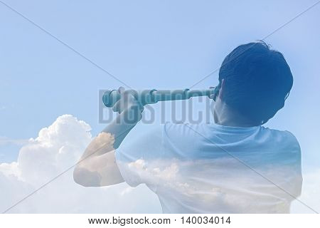 airy-fairy budding business man looking through a telescope in the clouds / in the clouds of hope