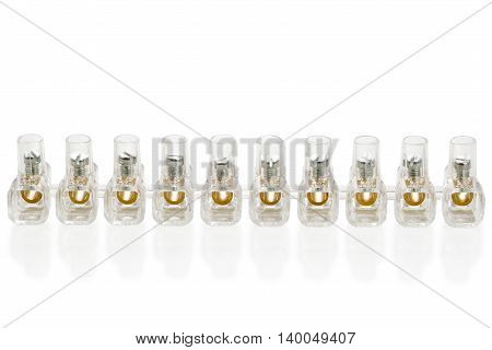 Planck connecting for wires with a copper insert and screw isolated on a white background