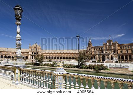SEVILLE, SPAIN - September 13, 2015: Detail of the ceramic tiled balustrade and lamp pole at the Plaza de Espana (Spain Square) on September 13, 2015 in Seville, Spain