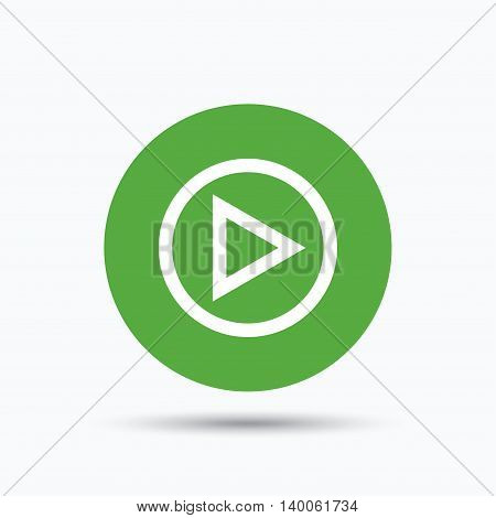 Play icon. Audio or Video player symbol. Flat web button with icon on white background. Green round pressbutton with shadow. Vector