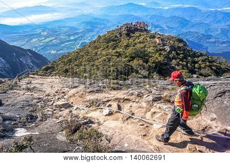 Ranau,Sabah,Borneo-March 13,2016:Climber move down from Low's Peak to Laban Rata check point at Mountain Kinabalu on 13th Mac 2016.There are two summit trails,Ranau Trail & Kota Belud Trail.
