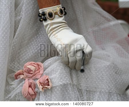 Elegant Lady With The Cigarette Holder And Vintage Style Dress