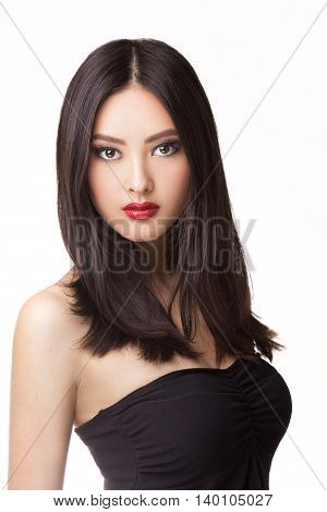 Beautiful young asian woman with long hair on white isolated background
