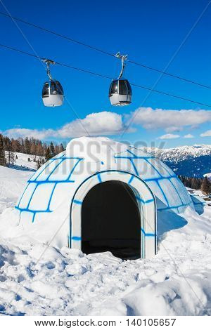 Cable car and a plastic igloo in mountain ski resort Nassfeld, Austria.