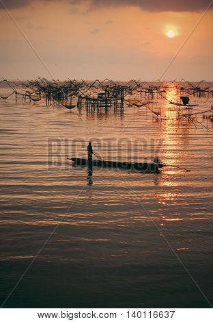 Fisherman life scene with square dip net in Phatthalung province Thailand