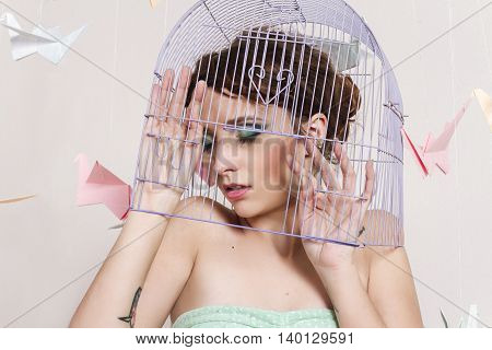 origami girl is home with paper birds