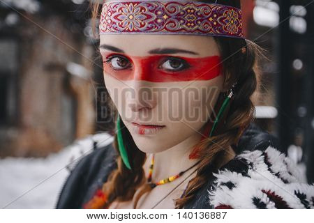 american indian girl with makeup in winter