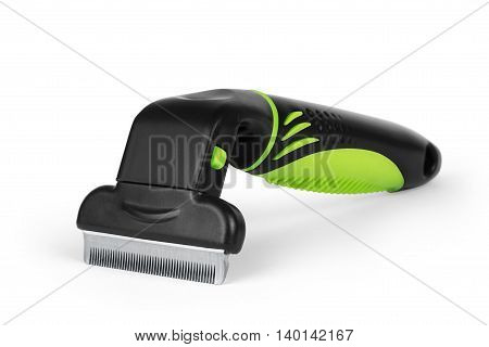 Furminators green lying on the white background