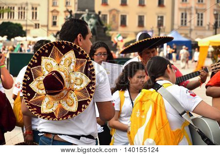KRAKOW POLAND - JUL 27 2016: World youth day 2016.International Catholic youth Convention. Young people on Main Square in Krakow.