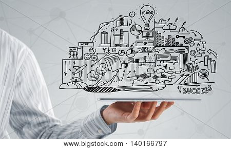 Businessman hand demostrating business strategy plan on tablet screen