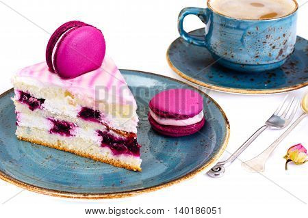 Sweet and Colourful Cake with French Macaroons. Studio Photo