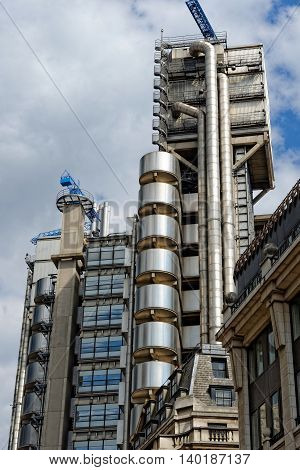 LONDON UK - JULY 1 2014: The Lloyd's Building also known as The Inside-Out Building home of insurance institution Lloyd of London. Like Pompidou Centre in Paris Lloyd was designed by Rogers 1986.