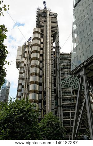 LONDON UK - JULY 1 2014: The Lloyd's Building also known as The Inside-Out Building home of insurance institution Lloyd of London. Like Pompidou Centre in Paris Lloyd was designed by Rogers 1986.