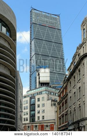 LONDON UK - JULY 1 2014: The famous office building - The Cheesegrater (Leadenhall Building) in the City of London one of the leading centers of global finance.