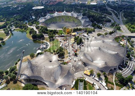 MUNICH GERMANY - AUGUST 4 2015: Aerial view of the Stadium and the Olympic Park constructed for the 1972 Summer Olympics seen from the 291 m high Olympic tower (Olympiaturm).