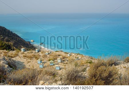 Beehives On Lefkada Island In Greece Ionian Turquoise Sea In The Background