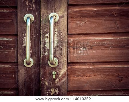 Old barn weathered wooden doors handle detail