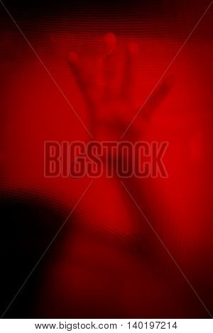 No panic,hand of woman behind stained or dirty window glass,Scary background for book cover