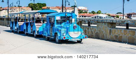 Nessebar, Bulgaria - July 25, 2016: Tourist train near in Nesebar old town, Bulgaria