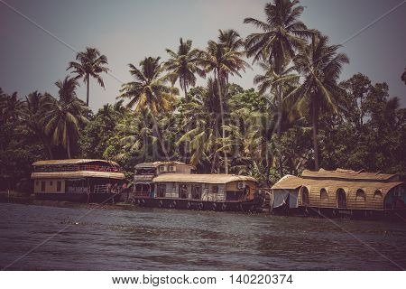 Allepey, Kerala, India, March 31, 2015: Backwater boats. Channels on the river in the city of Allapuzha
