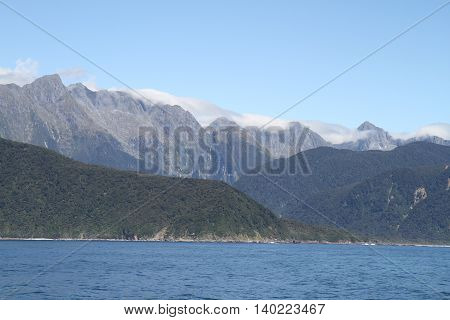 New Zealand Fjordland mountain panorama in sunshine 2