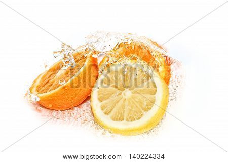 Water splash on lemon and orange slices