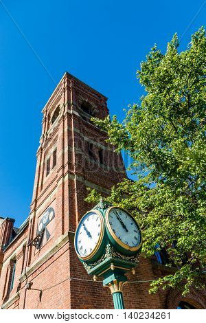 Town Clock by Brick Bell Tower in Charlottetown