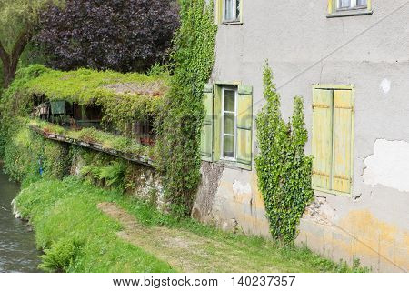French house with green shutters