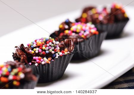 pastries made from corn cereal with added layers of chocolate color granules