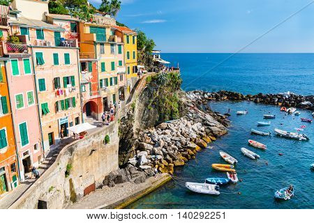 RIOMAGGIORE, ITALY - JULY 4: The coastal village of Riomaggiore on July 4, 2016.  Riomaggiore is one of the five villages of the Cinque Terre along the northwestern Italian coast.