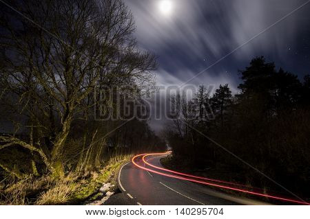 long exposure light trail on road at night