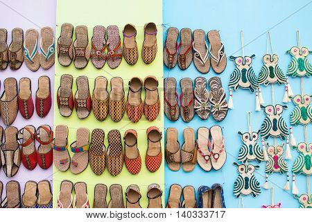 KOLKATA WEST BENGAL INDIA - NOVEMBER 28TH 2015 : Artworks of shoes and handicraft on display during the Handicraft Fair in Kolkata - the biggest handicrafts fair in Asia.