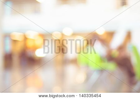 Blur Background : Business Man Reading Newpaper In Building