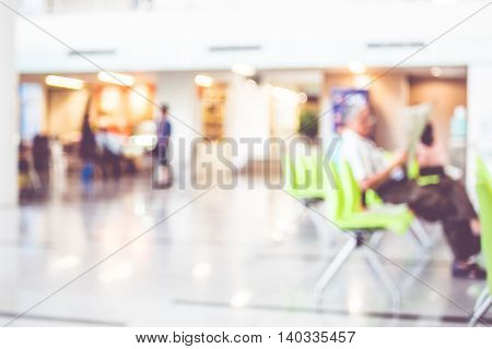 Blur Background : Business Man Reading Newpaper In Building