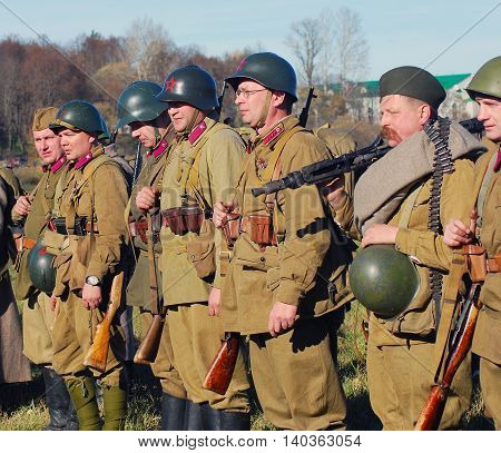MOSCOW REGION, RUSSIA - OCTOBER 13, 2013: Portrait of a reenactors dressed as WW II soldiers. The battle he is reenacting was the Moscow Battle held in 1941.