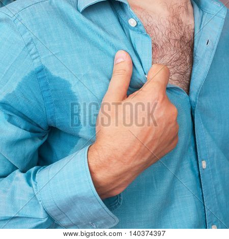 Sweaty Spot On The Shirt Because Of The Heat, Worries And Diffidence