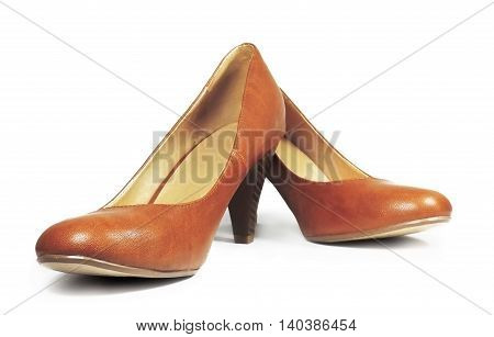 Brown pumps, leather shoes, isolated on white background.