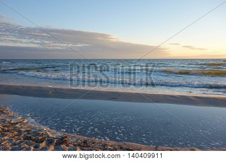Waves at sunset on Hiddensee Island Germany