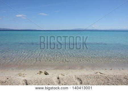 Beauriful nuances of blue colour on the Aegean sea beachGreece