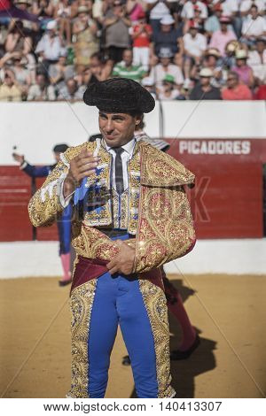 Sabiote SPAIN September 9 2011: The Spanish Bullfighter Francico Rivera bullfighting with the crutch in the Bullring of Sabiote Spain