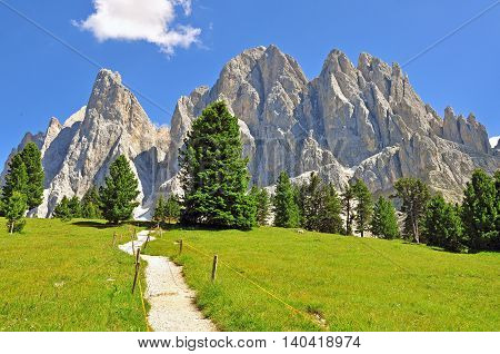 Winding road in Dolomites Alps on summer, Italy